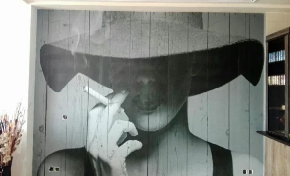 wallpaper installing in big wall home